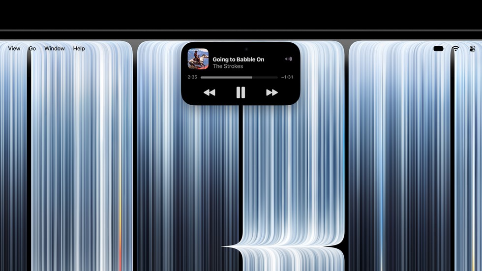 Dynamic Island del MacBook Pro mostrando controles de reproducción de Apple Music.